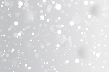 abstract beautiful bokeh is falling randomly with light glitters particles with space for your text for making flyer,wallpaper,cover,border,design,invitation,card and decoration.