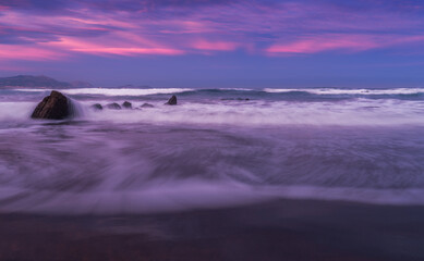 Fototapeta na wymiar Sunset on the beach with long exposure