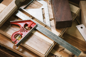 Combination Square · Stainless steel ruler with Precision Level on table,woodworking concept.selective focus.