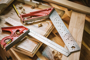 Combination Square · Stainless steel ruler with Precision Level on table,woodworking concept.selective focus