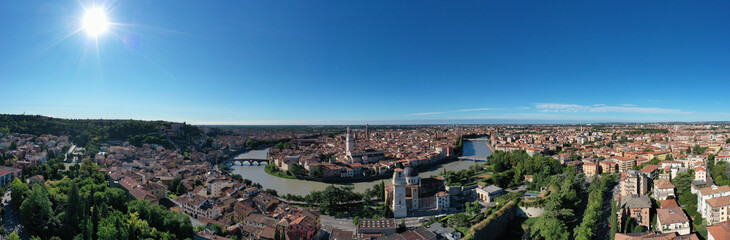 Fototapeta premium Panoramic top view of Verona city center. Aerial panorama of Verona, Italy. Italian medieval city drone view. Italian churches in the old city aerial view. Historic Italian town panorama top view.