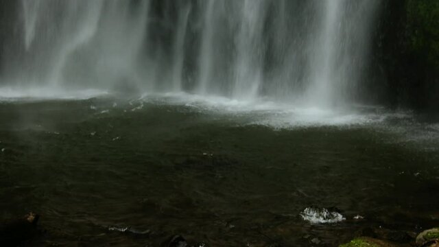 camera pan revealing the natural waterfall