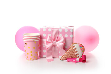 Pink birthday accessories isolated on white background