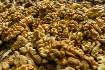 Obraz premium Peeled walnuts in close-up. Selective focus. Background image.