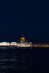 RUSSIA, Saint Petersburg: Scenic sunset cityscape view of the city architecture with Neva river bridges. Evening twightlight St. Isaac's Cathedral architecture 