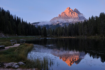 Lake Antorno sunset, mount peak reflects in the lake