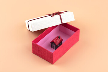 Open the house model inside the gift box