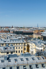 Obraz premium RUSSIA, Saint Petersburg: Scenic aerial cityscape view of the sunny city roofs and architecture with blue clear sky