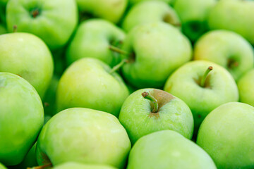 Fresh ripe green apples at the street market.