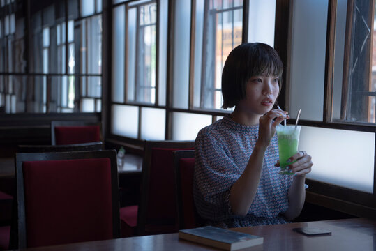 Woman in Japanese style Cafe