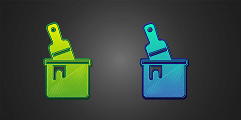 Obraz premium Green and blue Paint bucket with brush icon isolated on black background. Vector