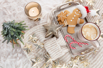 Hot chocolate with marshmallow on wool background. Christmas concept