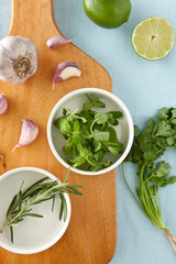 Fresh herb and vegetables on a dest
