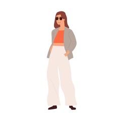Fototapeta premium Modern woman in fashion casual clothes and sunglasses. Happy female wearing trendy outfit, jacket, trousers and top. Person with hands in pockets. Flat vector illustration isolated on white background