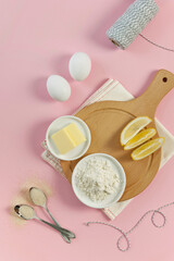 Ingredients for baking on pink background