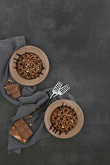 Chocolate waffle with nuts toppings