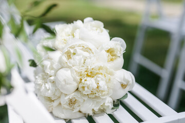 The bride's bouquet of white peonies.