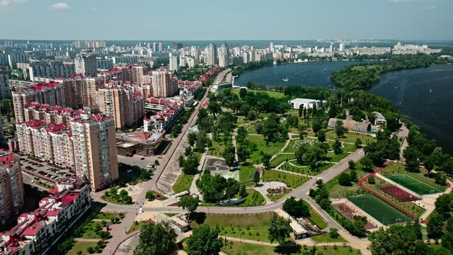 Aerial drone view on residential area and Dnipro River. Suburb recreational zone in Kyiv, Ukraine.