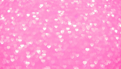 Background bokeh in the form of hearts of red and pink color. Copy space for text. The concept of romance and love. Valentine's Day. Shiny texture background. Festive background.