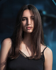 Fototapeta premium Woman fashion portrait on blue background
