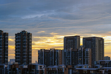 Fototapeta na wymiar Sunset through the buildings of Wuhan China