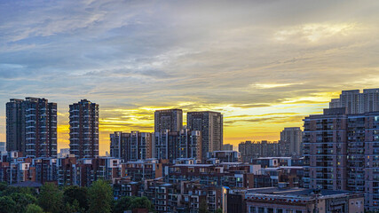 Sunset through the buildings of Wuhan China