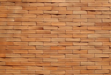 Brown rough clay tiles. Wall cladding. Background and texture. Copy space