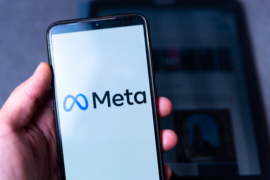 The logo of the company Meta is seen on the screen of a mobile phone in Barcelona, Spain on October 28, 2021. Facebook CEO Mark Zuckerberg announced on October 28 the name of the new umbrella company