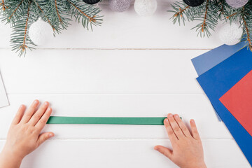 Step-by-step Greeting card 3D Christmas tree tutorial. Step 8: Fold entire sheet in neat accordion