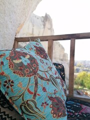 turquoise Turkish pillow with flower pattern detail