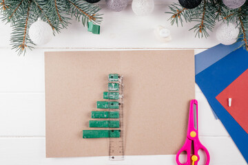 Step-by-step Greeting card 3D Christmas tree tutorial. Step 17: Apply glue to all the accordions...