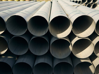 stacks of stainless steel pipes of the same diameter, pipes for the food industry