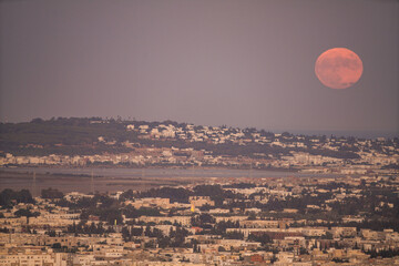 Full Moon rises above Tunis -- Tunisia 