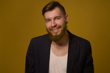 bearded man fashionable hairstyle jacket posing self confidence