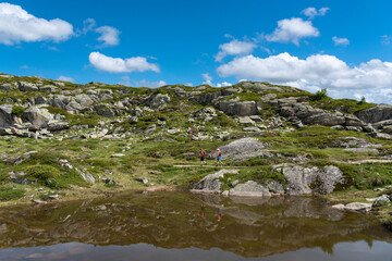 Hikers on the panoramic hiking trail near the Aletsch Glacier