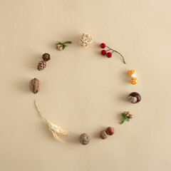 Nature flat lay with autumn leaves, wheat, mushrooms and fruits. Creative autumn minimal copy space concept.