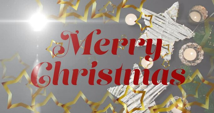 Animation of merry christmas text over decorations on grey background