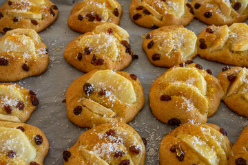  Homemade cookies on a plate with apple, raisins and coconut flakes 