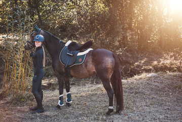 Reiterin mit deutschem Reitpony