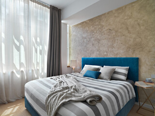 modern bedroom interior with a fabric bed