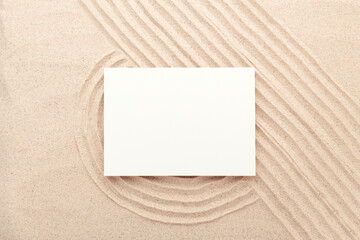 Blank card mockup on sand background. Lines drawn on the sand. Top view. Minimal design - 465955254