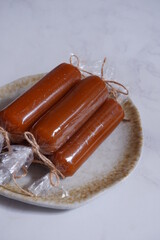 traditional dessert made from glutinous rice cake and palm sugar named dodol jenang in white background