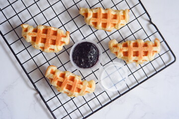 croissant waffle or known as croffle served with  jam