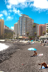 View of the city Puerto de la Cruz with its black sand beach. Tenerife. Canary Islands.