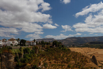 Fototapeta na wymiar Vista de los campos de Ronda y sus casas, Málaga , Andalucía , España