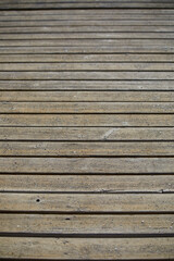 Wood texture. Floor of separated woods with cracks and full of sand. Beach path. Texture for matte painting.