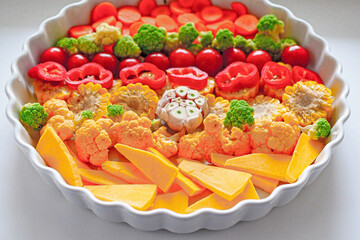 Vegetables for baking in the oven, close-up. Homemade casserole of vegetables. Healthy food background, vegan food