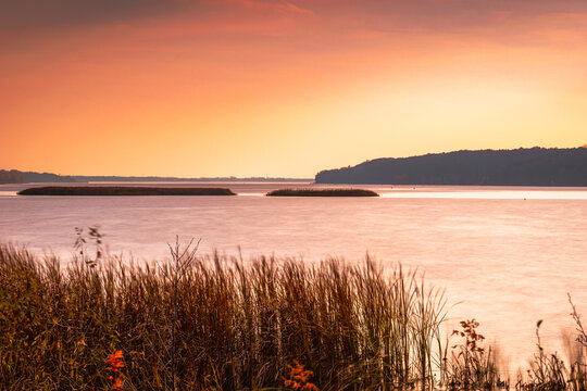 Autumn sunset landscape over the Narew River