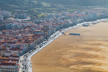 View of the coastal town, promenade and beach