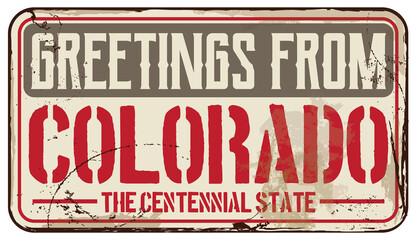 Greetings From Colorado Message On Damaged Signboard
